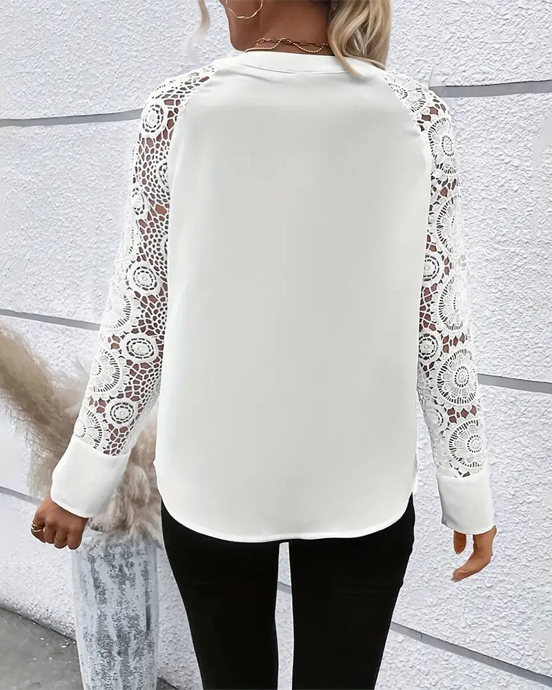 Elegant, plain blouse with long sleeves and lace