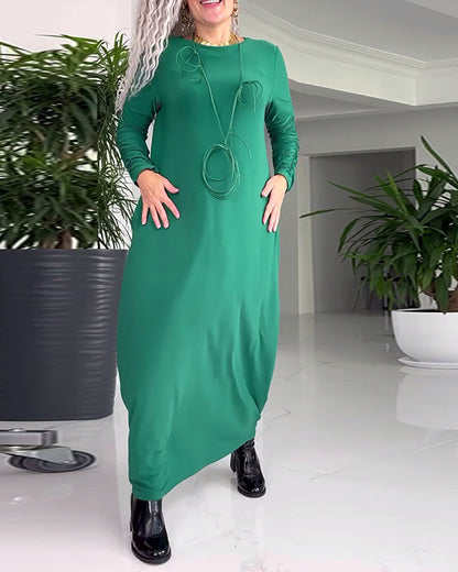 Elegantes Kleid mit Rundhalsausschnitt, einfarbig und langen Ärmeln