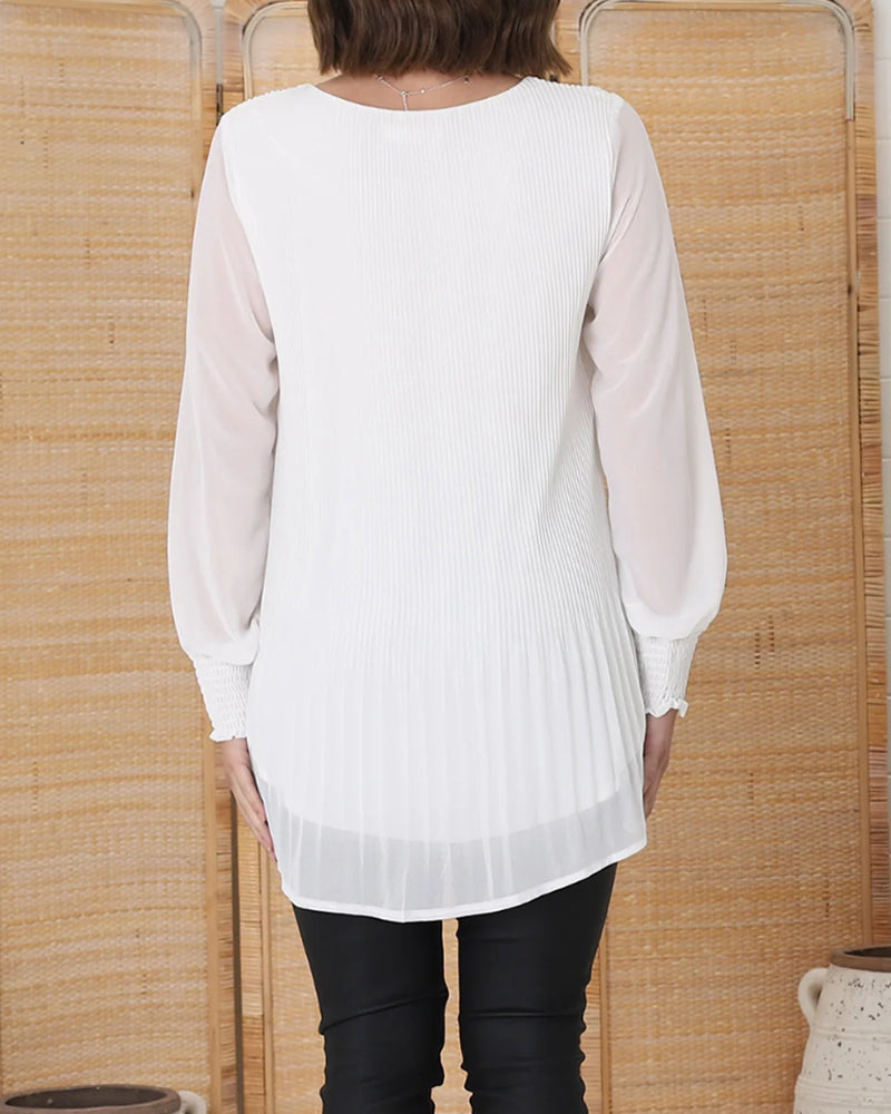 Casual solid color top with round neck, pleated and long sleeves