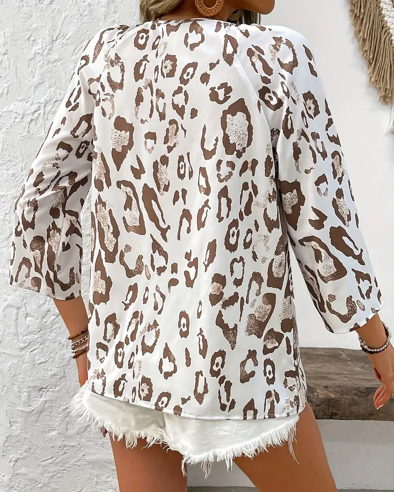 Elegant printed blouse with v-neck