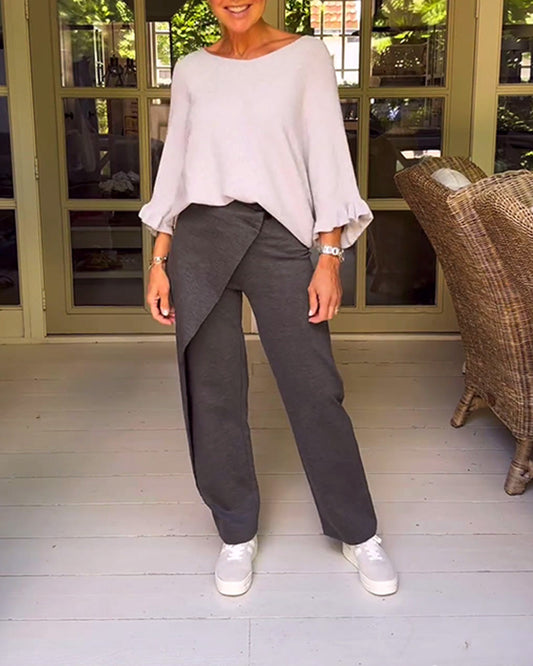 Casual, solid-colored trousers with irregular patchwork