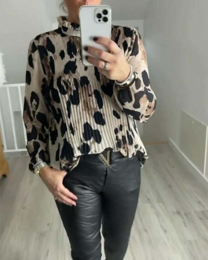 Casual printed blouse with stand collar and long sleeves and folds