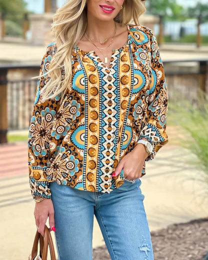 Blouse with lantern sleeves and retro print