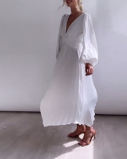 Vestido plissado elegante de cor sólida com decote em V