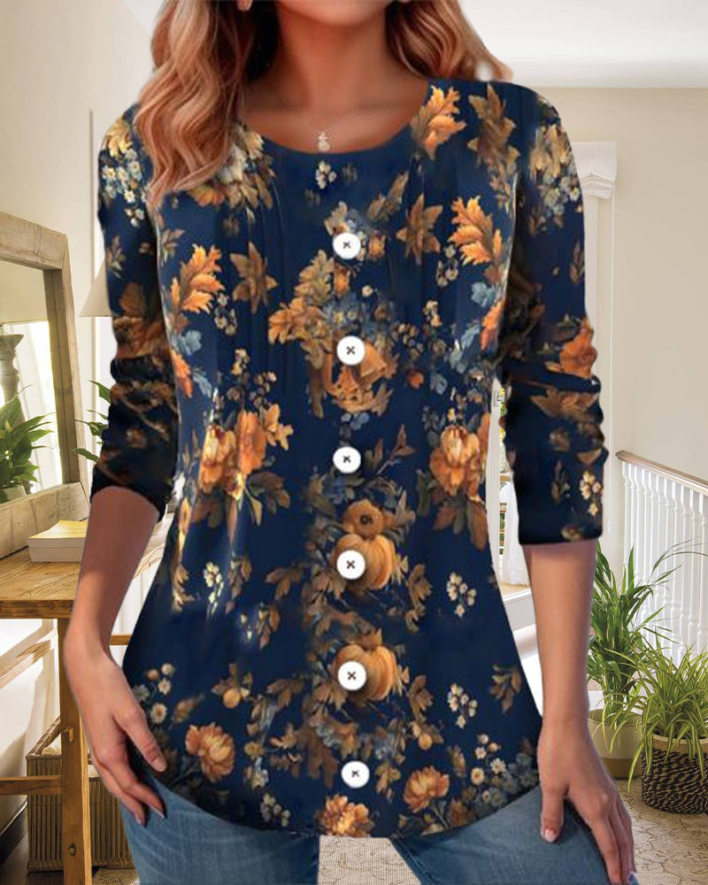 Casual round neck top with button placket and floral pattern