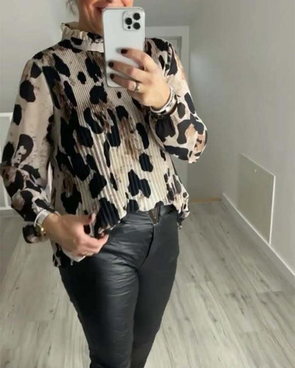 Casual printed blouse with stand collar and long sleeves and folds