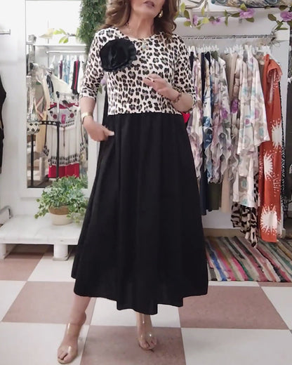 Vestido elegante con estampado de leopardo y paneles