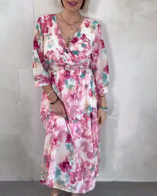 Modefest- Tailliertes kleid mit tintenprint und v-ausschnitt
