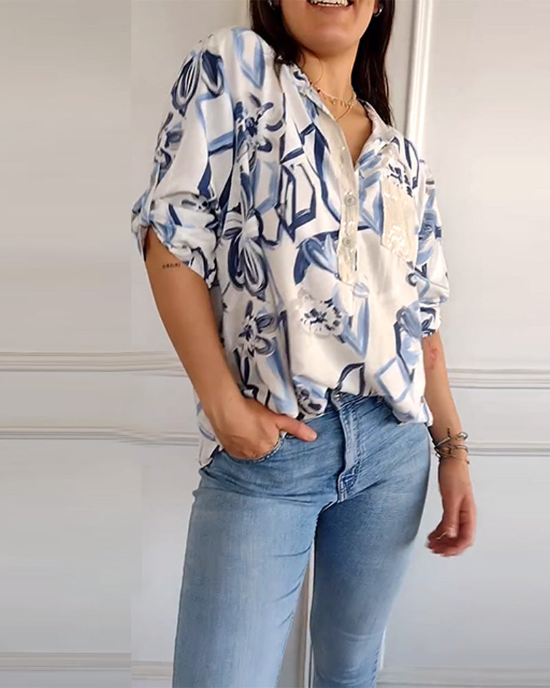 Elegante Bluse mit Pailletten und Blumendruck