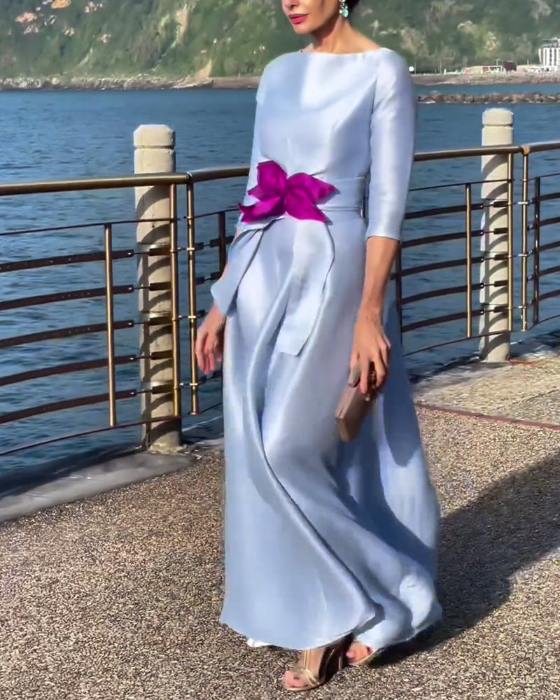 Elegant, plain dress with three-quarter sleeves and bow