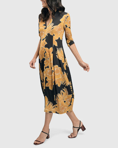 Elegant V-neck dress with contrasting floral print