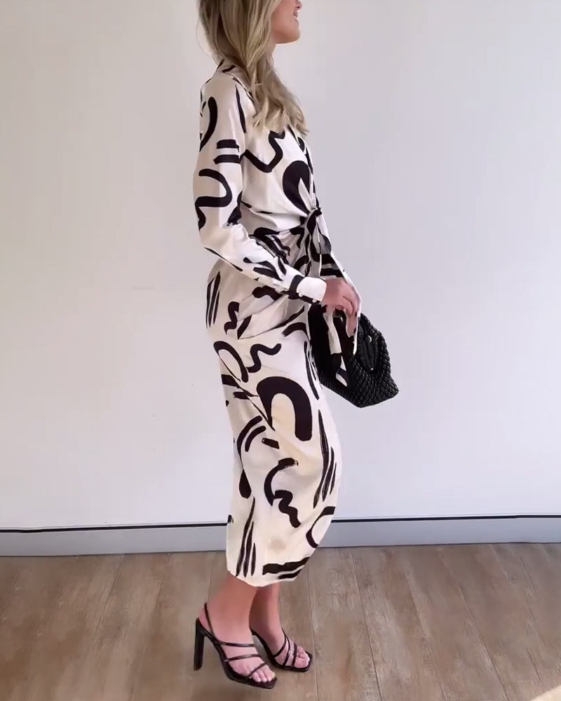 Fashionable printed dress with long sleeves and slit