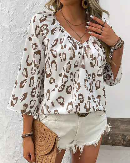 Elegant printed blouse with v-neck