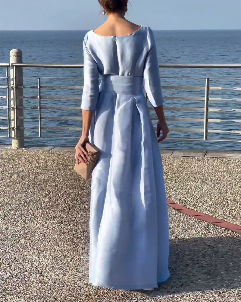 Elegant, plain dress with three-quarter sleeves and bow