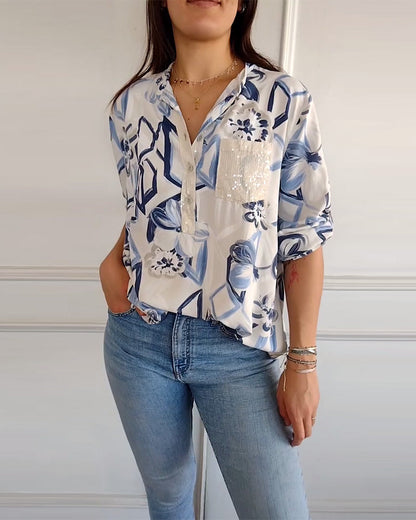 Elegante Bluse mit Pailletten und Blumendruck