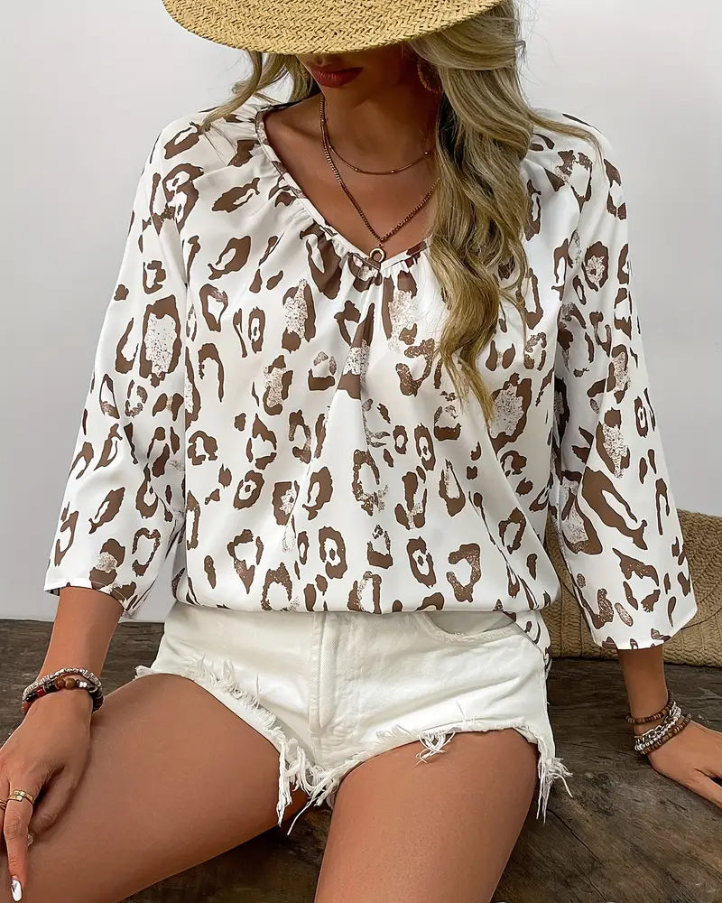 Elegant printed blouse with v-neck