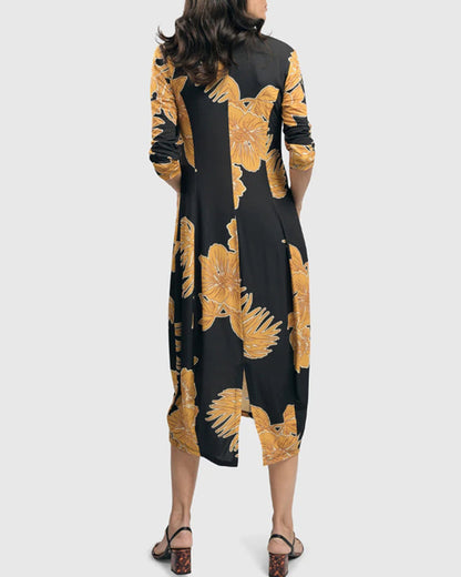 Elegant V-neck dress with contrasting floral print