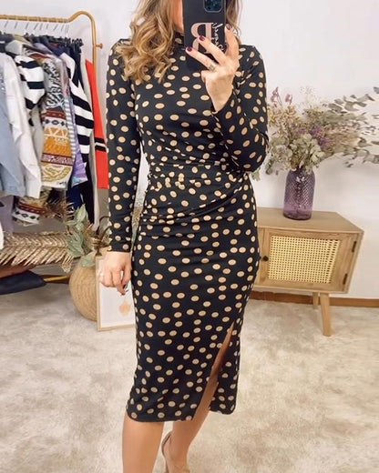 Fashionable dress with dotted pattern, stand-up collar and slit