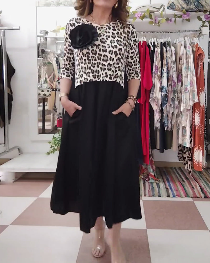 Vestido elegante con estampado de leopardo y paneles