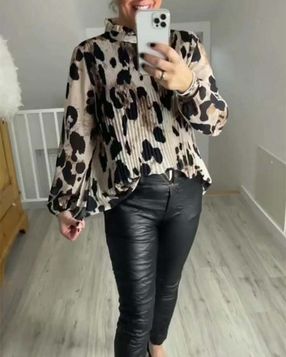 Casual printed blouse with stand collar and long sleeves and folds