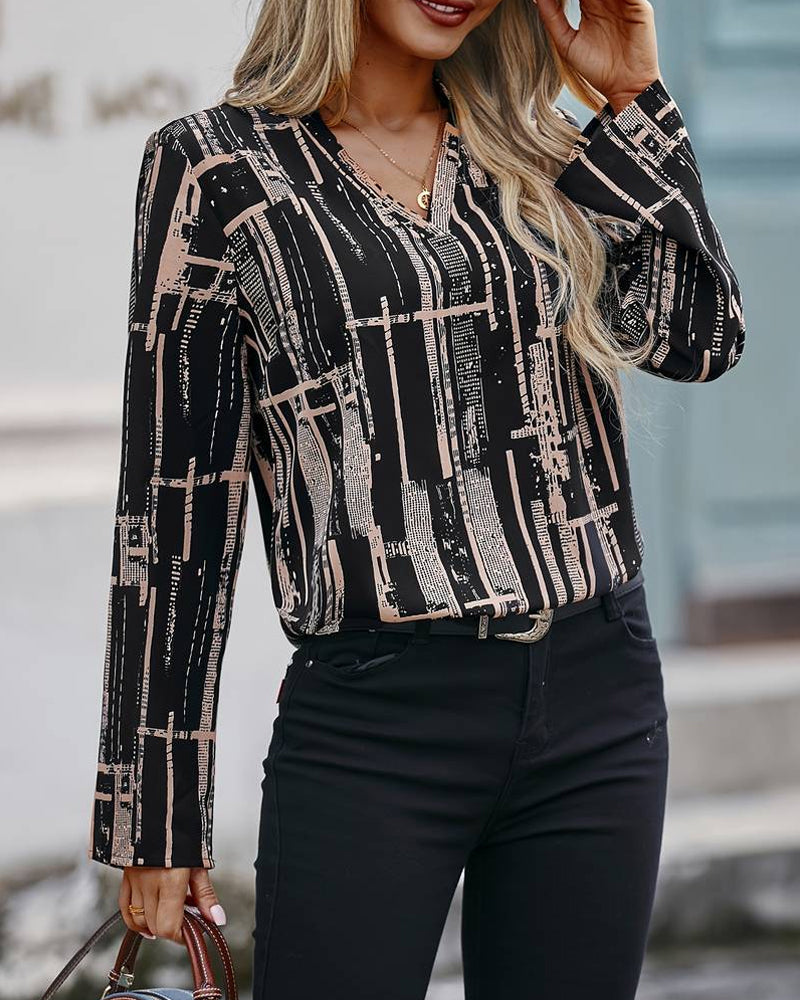 Modefest- Schlichte bedruckte Bluse mit V-Ausschnitt Schwarz