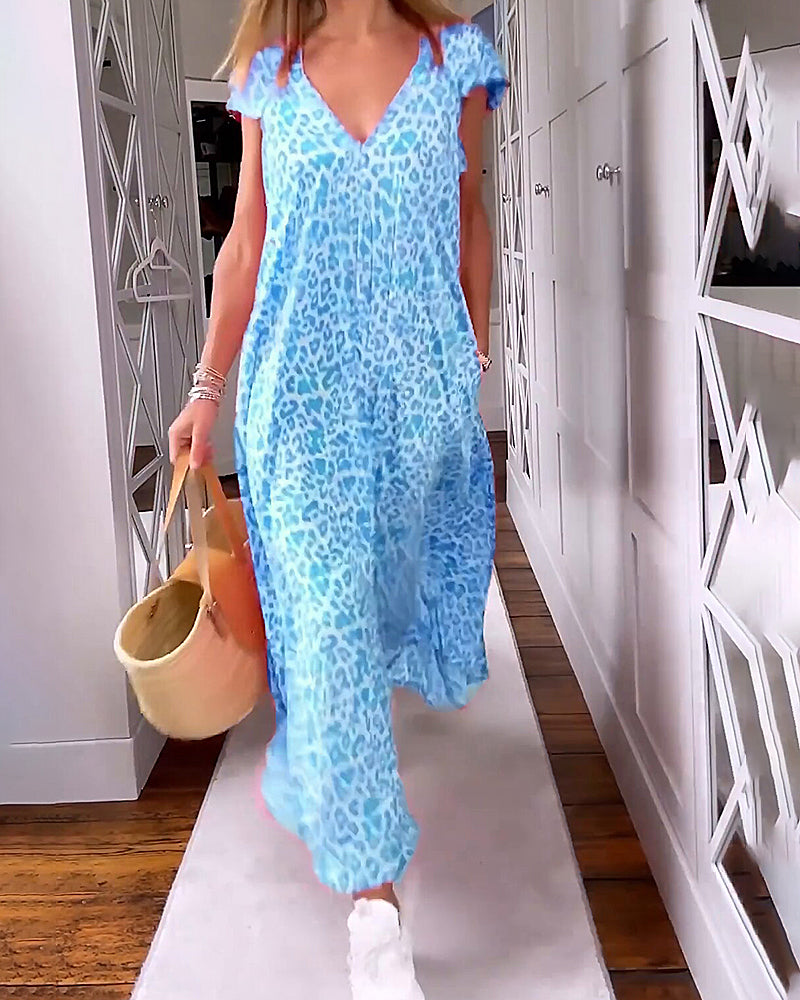 Modefest- Langes, bedrucktes Kleid mit V-Ausschnitt und kurzen Ärmeln Blau