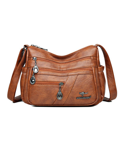 Modefest- Multi-pocket soft leather crossbody bag Braun